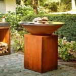 New Trends Modern Durable Outdoor Kitchen Barbecue Grill Corten Steel Charcoal Fire Table with Trolley and Flame Safety Device