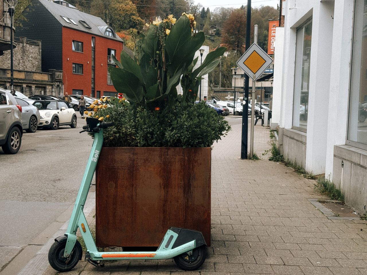 Corten steel planter box with plants in an outdoor landscape
