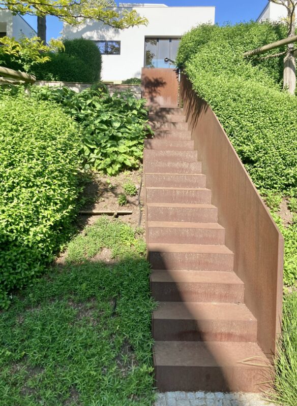 Corten steel garden steps in an Irish landscape with weathered patina