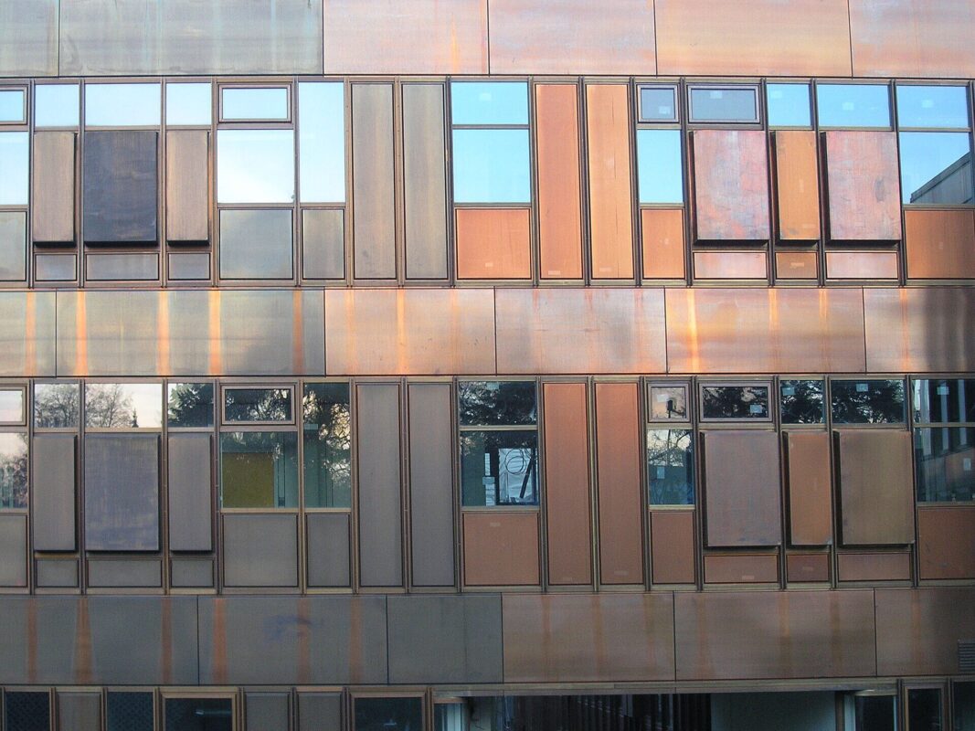 Corten steel facade panels with louvered openings on a German building