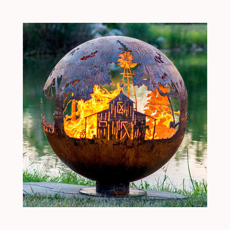 Spherical weathering steel fire feature with decorative cutouts
