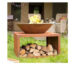 Weathered steel fire bowl with log storage stand outdoors