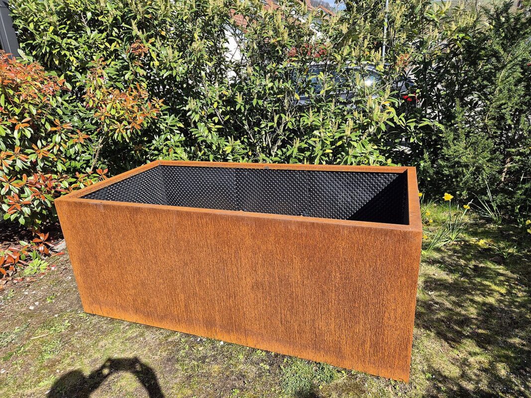 Real Corten steel raised garden bed with weathered patina for UK commercial landscape specification