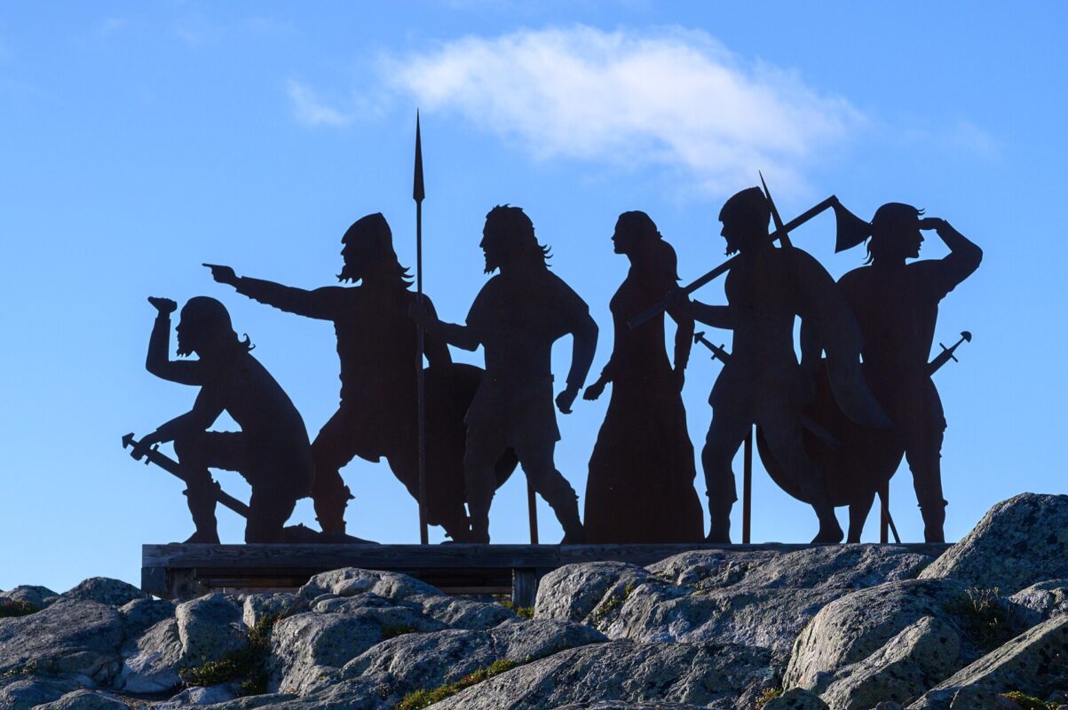 Real weathering steel silhouette sculpture in a Canadian coastal landscape