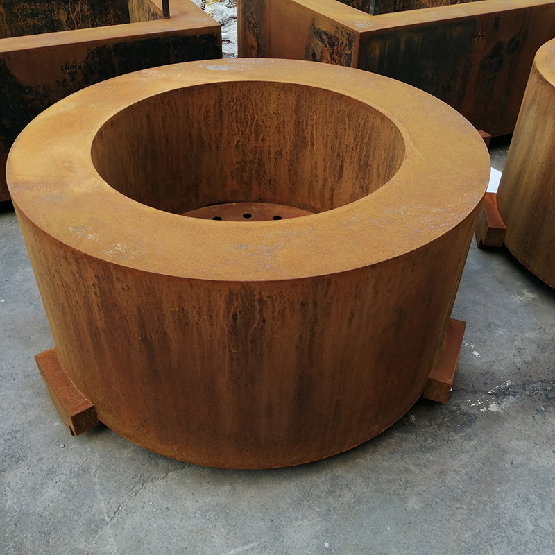 Round metal fire pit for outdoor garden projects