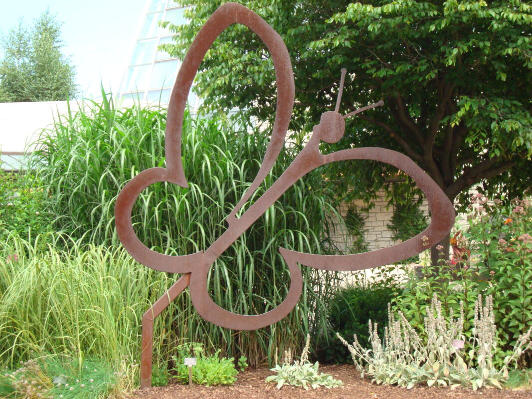 Germany France corten steel public art sculpture in planted landscape