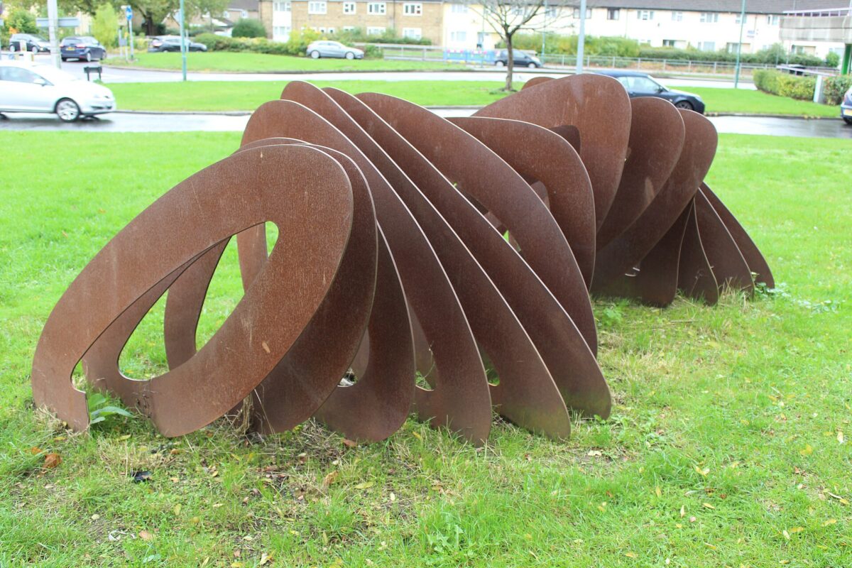 Real corten steel public sculpture with perforated weathering steel surface